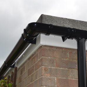 White fascia board with black guttering