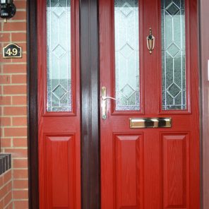 Red uPVC double glazed front doors with side panel including Ruby Diamond decorative glass