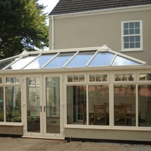 Cream uPVC hipped back Edwardian conservatory