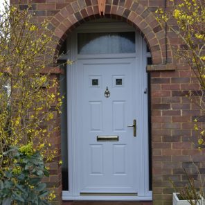 Queens white uPVC double glazed door with top light