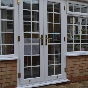 White uPVC French glazed doors with Georgian bars